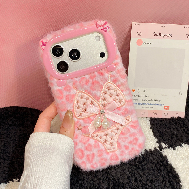 高級感のあるレオパード柄ビキニプリントのぬいぐるみ風スマホケ - Apple Iphone 15 のレビューと価格