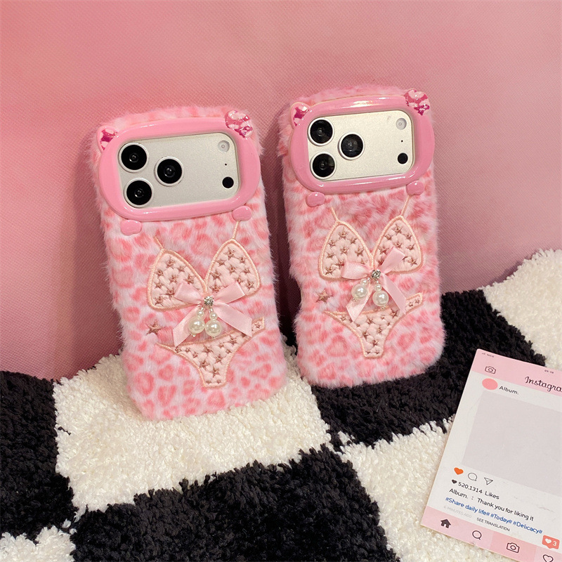 高級感のあるレオパード柄ビキニプリントのぬいぐるみ風スマホケ - Apple Iphone 15 のレビューと価格